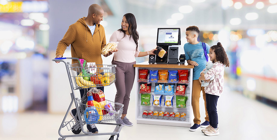 family using self-checkout